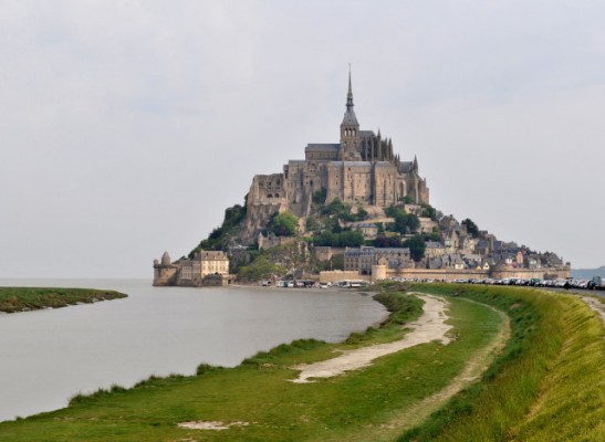 Picture taken on May 22, 2008 showing The Mont Saint-Michel, western france, which celebrated its 1300 year anniversary last May 1st. The Mont Saint-Michel and its bay were added to the UNESCO list of World Heritage Sites in 1979, for its cultural, historical, and architectural significance. It is the most visited touristic site in France after the Eiffel tower and Versailles chateau visited by three million tourists every year. On 16 June 2006, the French Prime Minister and regional authorities announced a ?164 million project (Projet Mont-Saint-Michel[1]) to build a hydraulic dam that will help remove the accumulated silt and make Mont Saint-Michel an island again. It is expected to be completed by 2012.  AFP PHOTO MYCHELE DANIAU        (Photo credit should read MYCHELE DANIAU/AFP/GettyImages)
