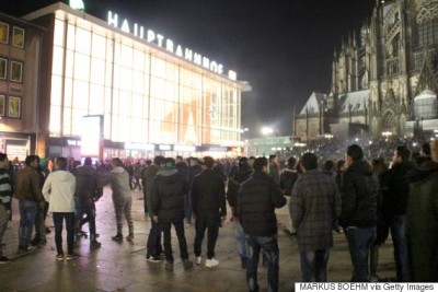 Picture taken on December 31, 2015 shows people gathering in front of the main railway station in Cologne, western Germany. Police in Cologne told AFP they have received more than 100 complaints by women reporting assaults ranging from groping to at least one reported rape, allegedly committed in a large crowd of revellers during year-end festivities outside the city's main train station and its famed Gothic cathedral. / AFP / dpa / Markus BOEHM / Germany OUT (Photo credit should read MARKUS BOEHM/AFP/Getty Images)