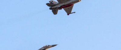 Israeli F-16 fighter jets perform during a graduation ceremony at the Hatzerim base in the Negev desert, near the southern Israeli city of Beersheva, on December 31, 2015. AFP PHOTO / JACK GUEZ / AFP / JACK GUEZ (Photo credit should read JACK GUEZ/AFP/Getty Images)