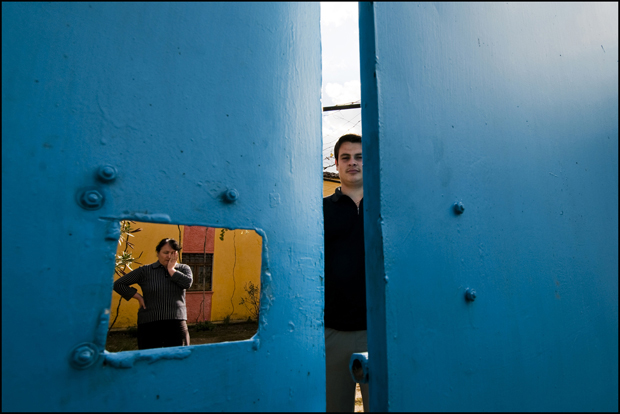 KALMET, ALBANIA. Rosa, 40 years, and her son Edi, 16 years. He is stuck in his house because of vendetta from 4 years. His father killed two neighbors in a dispute over severed power lines 4 years ago and despite he has been killed by the family of enemies, Edi risks the second revenge because his father has killed two people.