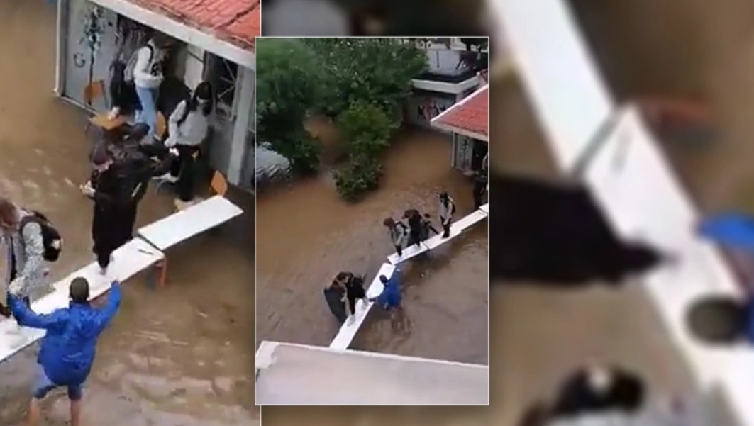 Σαρώνει η κακοκαιρία. Μαθητές στη Ν. Φιλαδέλφεια έφτιαξαν γέφυρα με θρανία για να βγουν από πλημμυρισμένες τάξεις